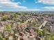 Expansive view of a leafy neighborhood and homes spread out under a blue, partly cloudy sky at 1056 Shady Valley Ne Pl, Brookhaven, GA 30324