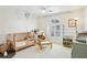 Bedroom with hardwood floors, natural light, modern ceiling fan, and plantation shutters at 1056 Shady Valley Ne Pl, Brookhaven, GA 30324