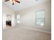 Bright bedroom with vaulted ceilings, a view into the bathroom, and neutral carpet at 120 Chastain Nw Rd # 1204, Kennesaw, GA 30144