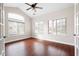 Bright bedroom with hardwood floors, vaulted ceilings, and large windows at 120 Chastain Nw Rd # 1204, Kennesaw, GA 30144