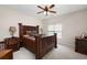 Bedroom with a bed and rustic decor and a ceiling fan at 120 Chastain Nw Rd # 1204, Kennesaw, GA 30144