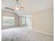 A large bedroom with high ceilings and plenty of natural light at 1909 Sawgrass Dr, Hampton, GA 30228