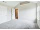 Bedroom featuring neutral paint, carpeting, and window at 1909 Sawgrass Dr, Hampton, GA 30228