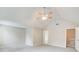 Spacious bedroom boasts a ceiling fan and neutral paint at 1909 Sawgrass Dr, Hampton, GA 30228