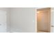 Hallway leading to downstairs, adjacent to a bedroom at 1909 Sawgrass Dr, Hampton, GA 30228