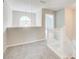 A spacious loft at the top of the stairs would be a great recreational room at 1909 Sawgrass Dr, Hampton, GA 30228