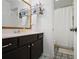Bathroom featuring a dark vanity and decorative tile flooring at 1101 Collier Nw Rd # V3, Atlanta, GA 30318