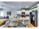 Modern kitchen features granite countertops, white cabinets, and stainless steel appliances at 1709 Creel Ln, Atlanta, GA 30349