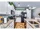 Well-equipped kitchen featuring granite countertops, white cabinets, and stainless steel appliances at 1709 Creel Ln, Atlanta, GA 30349