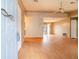 Bright and airy living room with hardwood floors and views into the dining area at 2410 Deep Shoals Cir, Decatur, GA 30034
