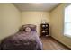Bedroom featuring stylish decor, wood-look floors, and natural light at 284 Southern Trace Way, Rockmart, GA 30153