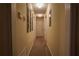 Clean hallway features neutral walls, carpet, and trim, and access to multiple rooms at 284 Southern Trace Way, Rockmart, GA 30153
