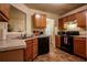 Functional kitchen featuring wood cabinets, modern appliances, and plenty of counter space for meal preparation at 284 Southern Trace Way, Rockmart, GA 30153