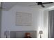 Bright bedroom featuring a modern art piece, side tables with lamps and dark gray curtains at 3445 Stratford Ne Rd # 2504, Atlanta, GA 30326