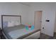 Cozy bedroom with a comfortable bed and a view into an adjacent room at 3445 Stratford Ne Rd # 2504, Atlanta, GA 30326