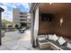 Inviting cabana with wood paneling, comfortable seating, and outdoor tv at 3445 Stratford Ne Rd # 2504, Atlanta, GA 30326
