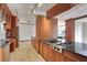 Spacious kitchen featuring hardwood cabinetry, stainless steel appliances, and tiled flooring at 3445 Stratford Ne Rd # 2504, Atlanta, GA 30326