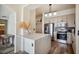 Open kitchen with stainless steel appliances, quartz countertops, and stylish gray cabinets and backsplash at 3445 Stratford Ne Rd # 2504, Atlanta, GA 30326