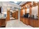 Resident lounge area with coffee station, dark wood cabinets, and decorative lighting at 3445 Stratford Ne Rd # 2504, Atlanta, GA 30326