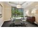 Meeting room with round table, comfortable chairs, large picture window with view, and sideboard at 3445 Stratford Ne Rd # 2504, Atlanta, GA 30326