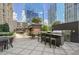 Elegant outdoor kitchen area with grill, bar seating and cabanas at 3445 Stratford Ne Rd # 2504, Atlanta, GA 30326