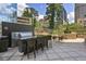 State-of-the-art outdoor kitchen with modern grill and seating at 3445 Stratford Ne Rd # 2504, Atlanta, GA 30326