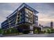 Modern multi-story condo building showcasing sleek architectural design at 567 Ponce De Leon Ne Ave # 404, Atlanta, GA 30308