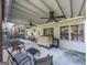 Spacious covered back porch with seating, ideal for outdoor entertaining and relaxation at 1009 Fairway Seven, Villa Rica, GA 30180