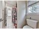 Bathroom with colorful shower curtain, toilet, tile floors and window at 1009 Fairway Seven, Villa Rica, GA 30180