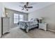 Cozy bedroom features carpet, ceiling fan and lots of natural light at 1009 Fairway Seven, Villa Rica, GA 30180