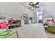 Playful bedroom space with desks, shelves, daybed and room to play at 1009 Fairway Seven, Villa Rica, GA 30180