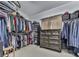 Large walk-in closet with custom shelving and ample storage space at 1009 Fairway Seven, Villa Rica, GA 30180