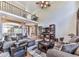 Open-concept living space with comfortable seating, built-in shelves, and ample natural light at 1009 Fairway Seven, Villa Rica, GA 30180