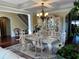 Formal dining area with decorative chandelier and seating for six at 6016 Southland Dr, Stone Mountain, GA 30087