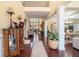 Grand foyer with hardwood floors, high ceilings, and elegant staircase at 6016 Southland Dr, Stone Mountain, GA 30087