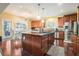 Gourmet kitchen with stainless steel appliances, center island, and custom cabinets at 6016 Southland Dr, Stone Mountain, GA 30087