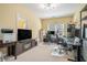 Versatile office space with desk and fireplace with a view of the backyard from a large window at 6016 Southland Dr, Stone Mountain, GA 30087