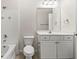 Bathroom with tile, cabinets and granite vanity at 1850 Cotillion Dr # 1008, Atlanta, GA 30338