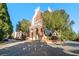 Beautiful brick condo building with manicured landscaping, trees, and a charming architectural design at 1850 Cotillion Dr # 1008, Atlanta, GA 30338