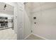 Laundry room with kitchen view, washer/dryer hookups, and storage shelves at 1850 Cotillion Dr # 1008, Atlanta, GA 30338