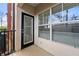 Private patio with door, large window and blinds at 1850 Cotillion Dr # 1008, Atlanta, GA 30338