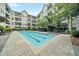 Community lap pool with seating area at 1850 Cotillion Dr # 1008, Atlanta, GA 30338