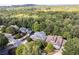Beautiful aerial view of the neighborhood, showcasing the homes surrounded by a canopy of trees at 216 Crescent Moon Way, Canton, GA 30114