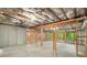 Unfinished basement with exposed wooden beams and insulation ready for customization at 216 Crescent Moon Way, Canton, GA 30114