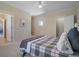 Bedroom featuring neutral walls, a ceiling fan and white trim and doors at 216 Crescent Moon Way, Canton, GA 30114