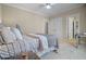 Comfortable bedroom featuring neutral walls, plush carpet, and a closet for ample storage at 216 Crescent Moon Way, Canton, GA 30114