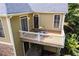 Beautiful deck with dining set, perfect for enjoying outdoor meals and relaxing with views of the surrounding landscape at 216 Crescent Moon Way, Canton, GA 30114