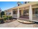 Inviting front porch featuring stylish columns, stone accents, and a warm, welcoming entrance at 216 Crescent Moon Way, Canton, GA 30114