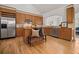 Modern kitchen showcasing custom cabinetry, stainless steel appliances, and granite countertops at 216 Crescent Moon Way, Canton, GA 30114