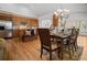 Well-appointed kitchen flows into dining area, featuring stainless steel appliances and ample storage at 216 Crescent Moon Way, Canton, GA 30114